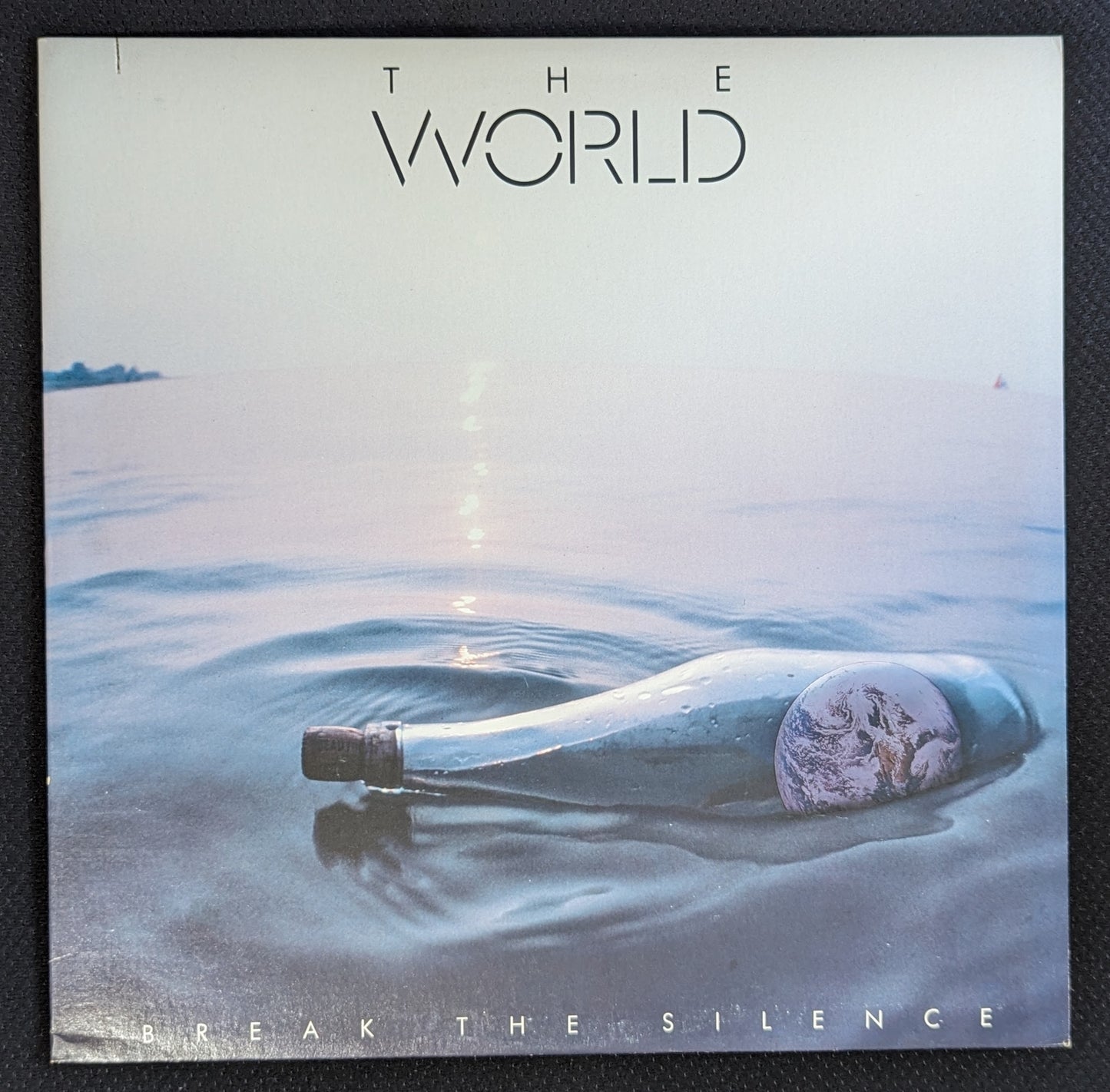 THE WORLD Break the Silence LP Vinyl Record 1983 Elektra 9 60291-1 (VG+ Vinyl, VG Sleeve)